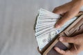 Close up Woman Hands taking out money America dollars banknotes