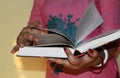 Close up on woman hands turning page in vintage book. Woman read a book Royalty Free Stock Photo