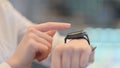 Close Up of Woman Hands using Smart Watch Royalty Free Stock Photo