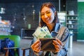 Woman hands with wallet and euro banknote money in cafe Royalty Free Stock Photo