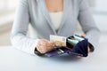Close up of woman hands with wallet and euro money Royalty Free Stock Photo