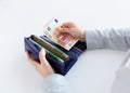 Close up of woman hands with wallet and euro money Royalty Free Stock Photo