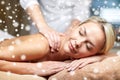 Close up of woman having back massage in spa Royalty Free Stock Photo