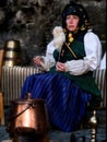 Woman with typical costume spinning in AnsÃÂ³.