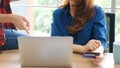 Close up of woman holding credit card and using laptop computer for shopping online, business and technology concept, digital Royalty Free Stock Photo