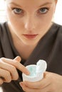 Close-up of woman holding facial cleanser