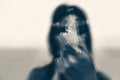 Close up of woman holding magic stone. black and white. double exposure Royalty Free Stock Photo