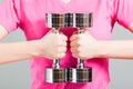 Close-up of woman holding metal chromed dumbbells Royalty Free Stock Photo