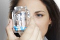 Close up of woman holding pill container Royalty Free Stock Photo