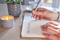 Close Up Of Woman At Home Writing In Gratitude Journal Royalty Free Stock Photo