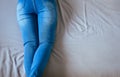 Close up of woman legs with blue jeans,Feet and stretch lazily Royalty Free Stock Photo