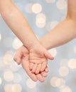 Close up of woman and little child hands together Royalty Free Stock Photo