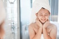 Close up woman looking her face in the mirror with smiling after bath, health care and beauty Royalty Free Stock Photo