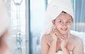 Close up woman looking her face in the mirror with smiling after bath, health care and beauty Royalty Free Stock Photo