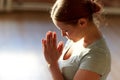 Close up of woman meditating at yoga studio Royalty Free Stock Photo