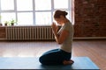 Close up of woman meditating at yoga studio Royalty Free Stock Photo