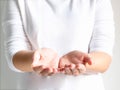 Close-up of a woman opening her palms that symbol of giving or donating