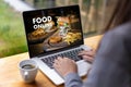 Close up woman ordering food online by internet Concept order