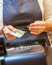 Woman is paying In cash with euro banknotes Royalty Free Stock Photo