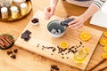 Woman preparing natural cosmetics