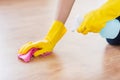 Close up of woman with rag cleaning floor at home Royalty Free Stock Photo