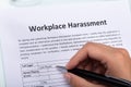 Woman Filling Workplace Harassment Form