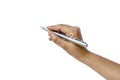 Close-up of a woman`s hand holding a pen and writing gesture on a white background. Royalty Free Stock Photo