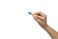 Close-up of a woman`s hand holding a pen and writing gesture on a white background Royalty Free Stock Photo