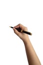 Close-up of a woman`s hand holding a pen and writing gesture on a white background Royalty Free Stock Photo