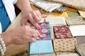 Close up of woman's hand sewing patchwork Royalty Free Stock Photo
