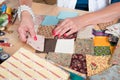 Close up of woman's hand sewing patchwork Royalty Free Stock Photo