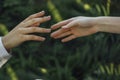 Close up of a woman`s hand touching the grass, feeling nature Royalty Free Stock Photo