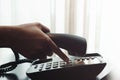 Close-up of Woman`s Hand using a Telephone in House or Hotel nea Royalty Free Stock Photo