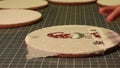 Woman applying paste on cortical table