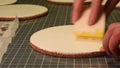 Woman applying paste on cortical table