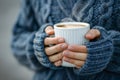 Close-up of a woman\'s hands holding a drink cup, Female hands holding a mug with coffee, generated ai Royalty Free Stock Photo