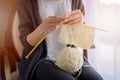 Close up on woman's hands knitting Royalty Free Stock Photo