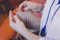 Close-up of woman`s hands knitting Royalty Free Stock Photo