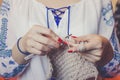 Close-up of woman`s hands knitting Royalty Free Stock Photo