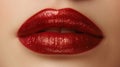 Close-up of woman\'s lips in bright red color