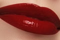 Close-up of woman's lips with fashion dark red lipstick makeup. Royalty Free Stock Photo