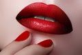 Close-up of woman's lips with fashion make-up and manicure. Beau