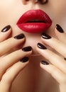 Close-up of woman's lips with fashion red make-up, nails. Beauty surgery, cosmetology