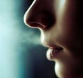 Close up of woman\'s noise smelling the air