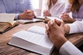 Woman`s Praying Hand On Bible Royalty Free Stock Photo