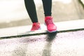 Close up of womanÃÂ´s sports shoes. Young woman running up stairs. Healthy lifestyle. Fitness sport. Cardio training Royalty Free Stock Photo