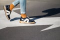 Close up of woman shoes standing on the street Royalty Free Stock Photo