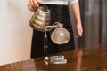 Close up of woman with siphon coffee maker and pot Royalty Free Stock Photo