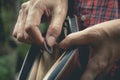 Close-up woman standing and holding money coin with wallet Royalty Free Stock Photo