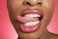 Close up of woman sticking out tongue